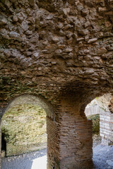 Naklejka premium Durres,Albania, August 7,2024:inside the amphitheater of the city of Durres, the largest Roman amphitheater in the Balkans
