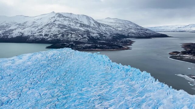 Perito Moreno Glacier At El Calafate Santa Cruz Argentina. Aerial View Of Massive Glacier Calves Into A Lagoon Of Icy Water. Outdoor Travel Destinations Patagonia Glacier.