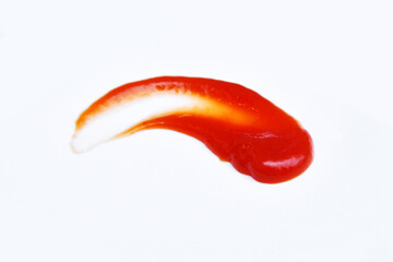 Smear of barbecue sauce ketchup close up view isolated on white background