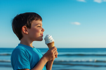 A young boy in a blue shirt enjoying an ice cream cone by the sea, with the ocean in the background, capturing a moment of summer delight and relaxation.