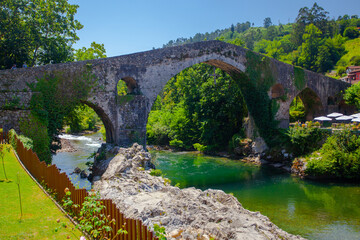 Beautiful mountain river and ancient bridge in Olla de San Vicente , Spain
