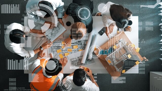 Top down view of skilled architect engineer team working together to design house. Aerial view of project manager pointing and explain construction with financial chart and statistic. Alimentation.
