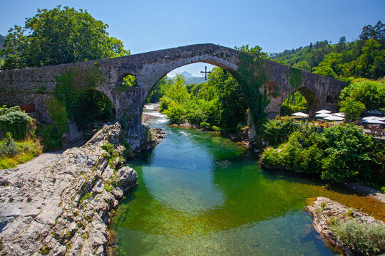 Beautiful mountain river and ancient bridge in Olla de San Vicente , Spain