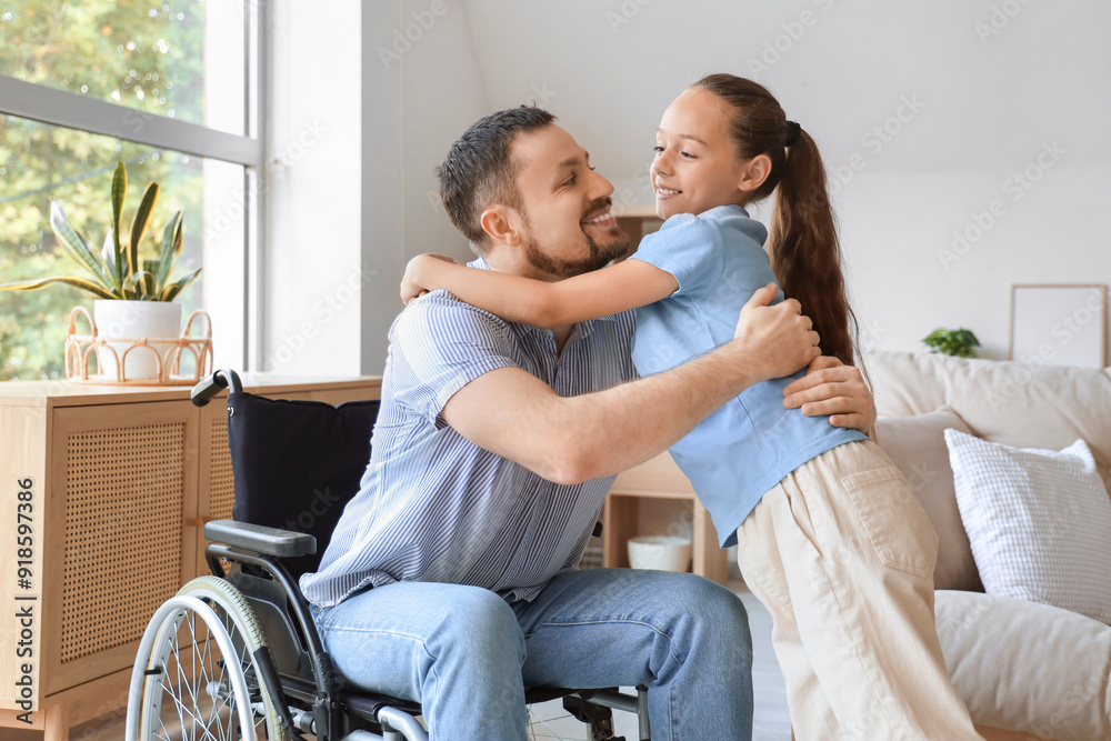 Poster Little girl hugging her father in wheelchair at home