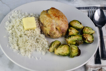 chicken thighs  with rice and brussel sprouts