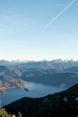 Aerial View of a Serene Mountain Lake Under a Clear Sky