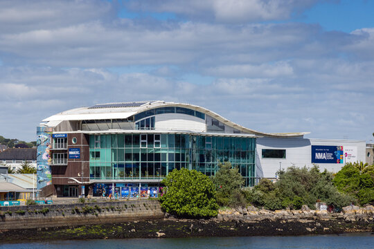 The National Marine Aquarium on Plymouth's Barbican on a bright sunny day in Devon.