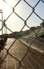 afternoon sun on the track around the football field