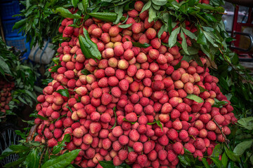 Ripe lychees, ready for sale at the market. Vibrant colors and juicy sweetness of this tropical delight, straight from the orchard to your table. Lychee, Litchi, Lichee, fruit
