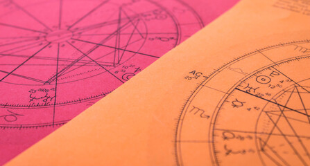 Printed orange astrology chart with ascendant, Mercury and Jupiter in Libra, detail © Blazenka
