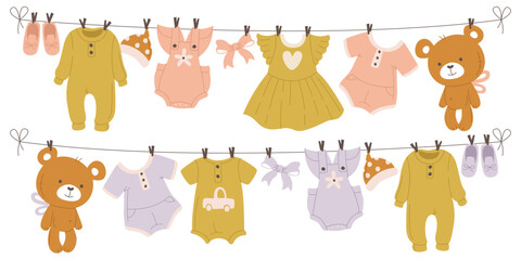 Baby child clothes drying hanging on rope, clean infant garment and accessories after laundry