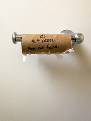 An empty toilet roll with a 404 not found error on it