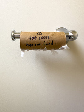 An empty toilet roll with a 404 not found error on it