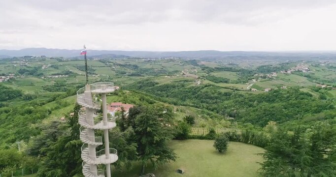Aerial drone view pan of the Collio hills, Cormons, Nova Gorica near Gorizia. European Capital of Culture 2025. Typical local products vineyards and wines. Gonjače Tower places to visit and tradition.