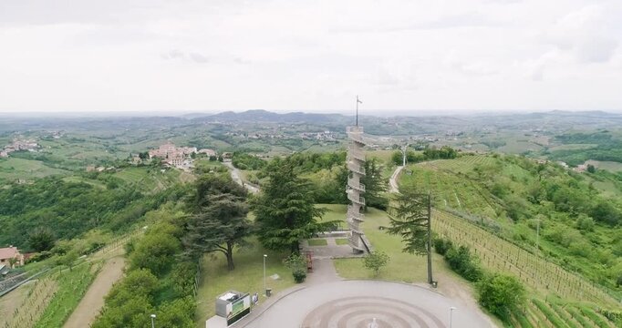 Aerial drone view pan of the Collio hills, Cormons, Nova Gorica near Gorizia. European Capital of Culture 2025. Typical local products vineyards and wines. Gonjače Tower places to visit and tradition.