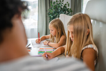 two young girl child write homework at home