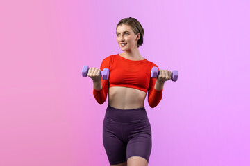 Full body length gaiety shot athletic and sporty woman with dumbbell for weight lifting as bodybuilding exercise in standing posture on isolated background. Healthy active and body care lifestyle