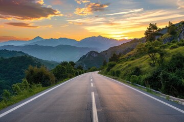 A scenic view of a long road stretching into the distance, flanked by majestic mountains