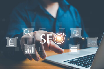 SEO Search Engine, Businessman use laptop to analyze SEO search engine optimization for promoting ranking traffic on website and optimizing your website to rank in search engines. digital marketing.