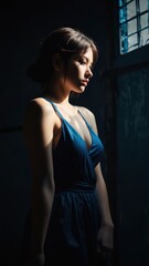 Whispers of Elegance: A Portrait in Blue and Shadow