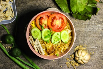 Fried rice or Nasi goreng, traditional frying rice dish from indonesia made of Precooked rice fried in a small amount of oil