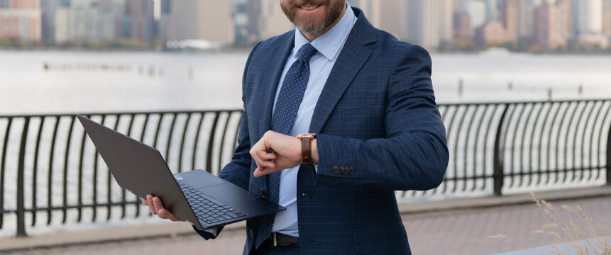 Business man getting late. Punctual man check time on wristwatch. Business meeting online deadline. Successful businessman checking time. Businessman check time outdoor, cropped view