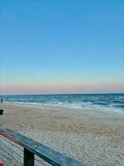 Beautiful, pastel, summer sunset over the beach at Tobay Beach 