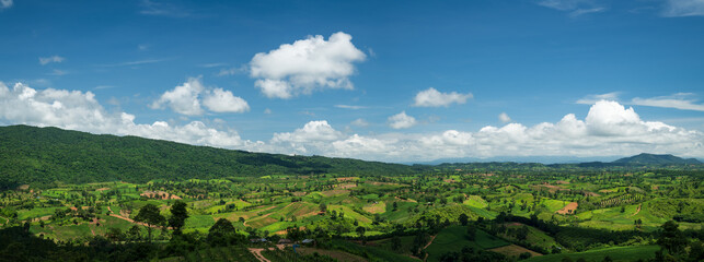 Beautiful natural panoramic countryside landscape. Rainforest ecosystem and healthy environment concept background. Top view forest and mountain in Thailand.