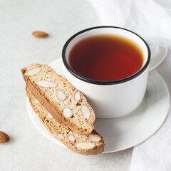 almond biscotti on a white plate, almond cantucci cookies on a white plate