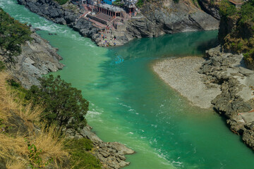 Bhagirathi river from left side and Alakananda river with turquoise blue colour from right side...