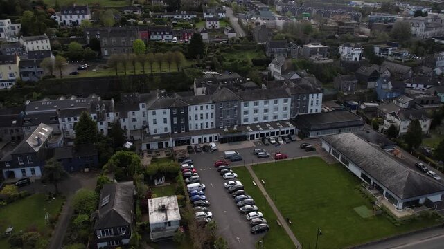 Kinsale, Ireland. Aerial View of Buildings and Coastal Traffic on Cloudy Day