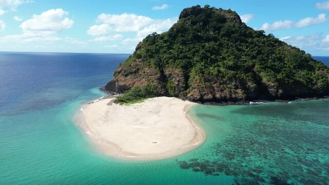 Moh&eacute;li or Mwali, part of the Union of the Comoros drone approach little islet with white sand tropical beach and Indian Ocean sea pristine blue clear water