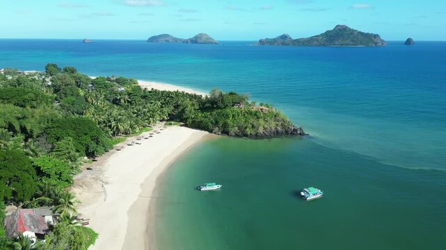 aerial scenic tropical beach island seascape in Indian Ocean blue waters of the Mozambique Channel, Moh&eacute;li or Mwali, part of the Union of the Comoros