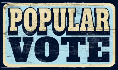 Obraz premium Aged retro popular vote sign on wood