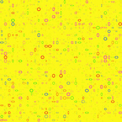 Seamless background from multi-colored rings on a yellow background.