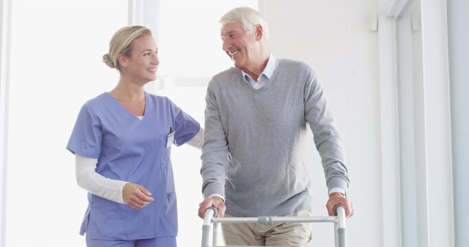 Man, walking frame and nurse care in hospital for leg support, rehabilitation help or patient trust. Old person, woman and steps for elderly mobility strength, recovery assistance or wellbeing plan