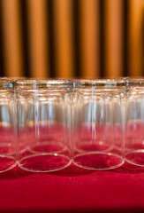 Stacks of clean glasses upside down glasses in the restaurant