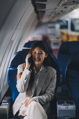 Asian woman sitting in a seat in airplane and looking out the window going on a trip vacation travel concept.Capture the allure of wanderlust with this stunning image