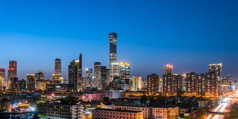 Obraz premium High angle night view of the Beijing Guomao CBD architectural complex in China