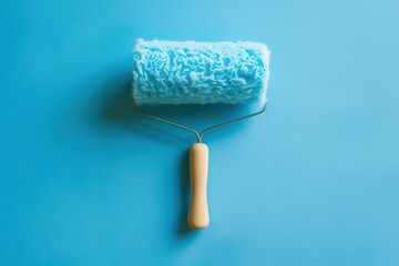 Obraz premium Blue background with lint roller
