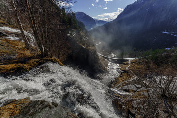 Skjervefossen Waterfall in Spring Landscape