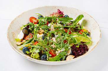 fresh salad with cheese and blueberries