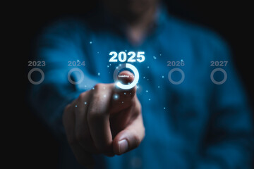 Businessman touching to loading of 2025 year for countdown merry Christmas and happy new year concept.