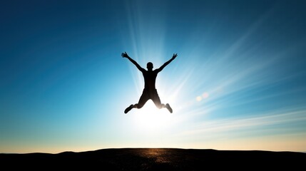 A silhouette of a man jumping with