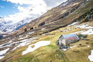 Mountain Cabin in Swiss Alps Landscape 