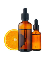 Vitamin C cosmetic bottle in with orange on white background