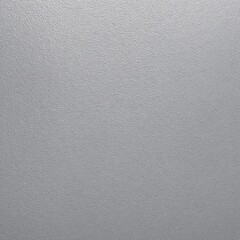 A close-up texture of a smooth, gray plastic surface with a subtle, fine-grain pattern. The even texture and neutral color make it ideal for backgrounds, industrial designs, or material studies.