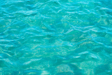 The surface of the water in an artificial pool.