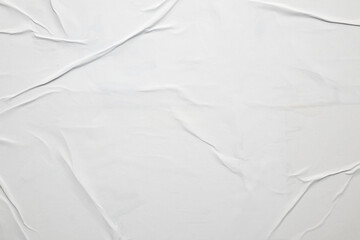 white crumpled and creased glued wrinkled paper poster texture background