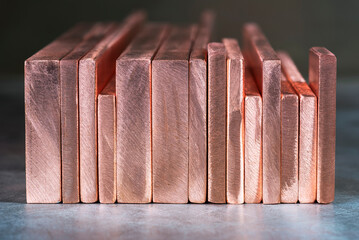 Row of copper flat bars, product of the non-ferrous metals industry